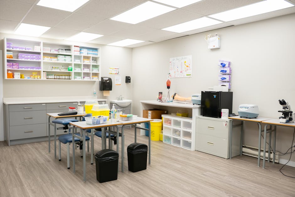 Bright and organized medical office interior featuring lab equipment and storage.